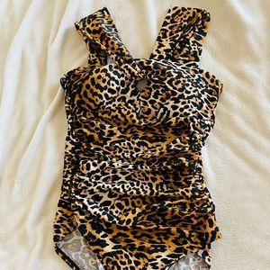 Stunning one piece Calvin Klein bathing suit  size 12 NWT Cheetah print